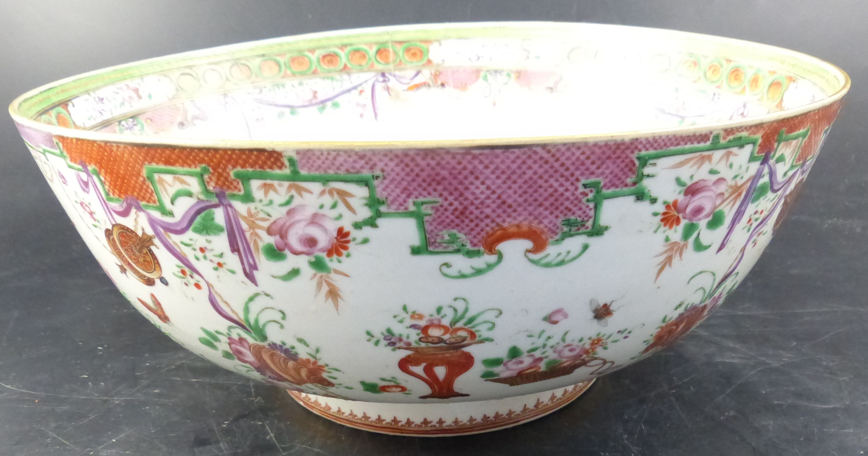 A pair of famille rose punch bowls, Qing dynasty, 18th century, diameter 29cm (both a.f.)
